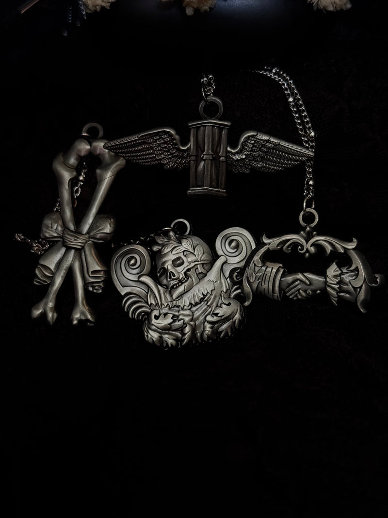 Carved In Stone- Skull and Plumes by Seance Perfumes
