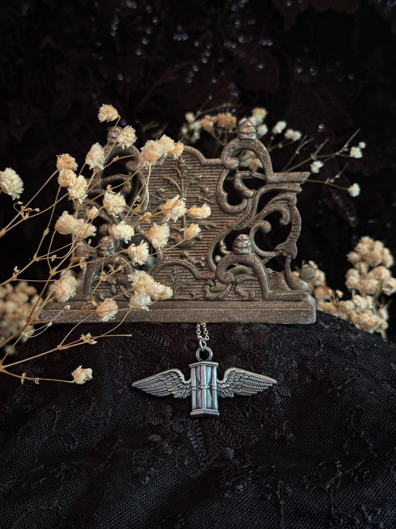 Carved In Stone- Hour Glass with Wings by Seance