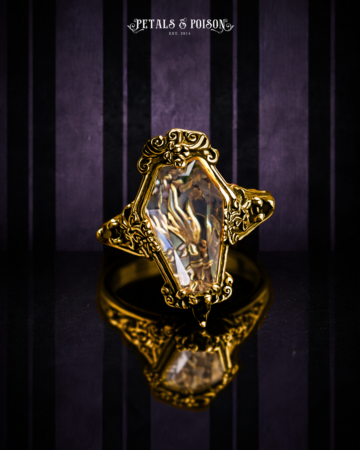 The GOLD "Mourning Hand” Glass Casket Ring by Petals and Poison