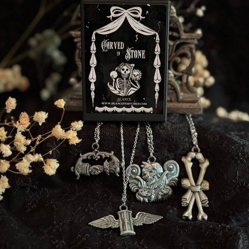 Carved In Stone- Hour Glass with Wings by Seance