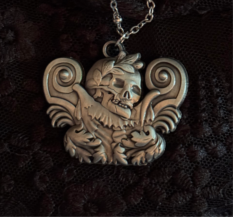 Carved In Stone- Skull and Plumes by Seance Perfumes