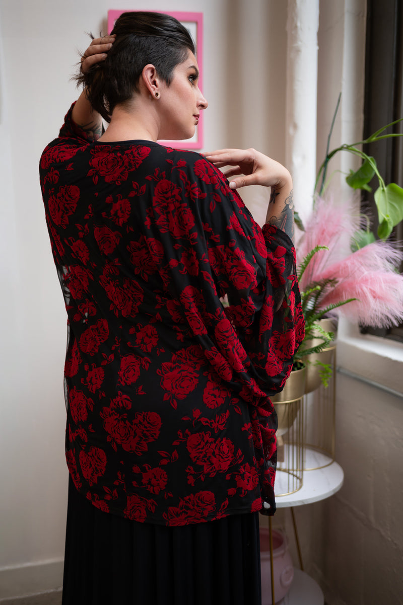 Model showcasing the oversized Red Rose Flocked Mesh Kimono with long sleeves, perfect for a dramatic goth look.