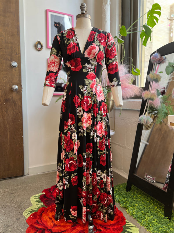 Raquel 3/4 Sleeve Maxi Dress in red rose print, featuring soft brushed knit and flattering waist-snatching silhouette.