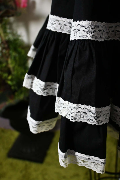 adelaide sweetheart black swing dress with white lace