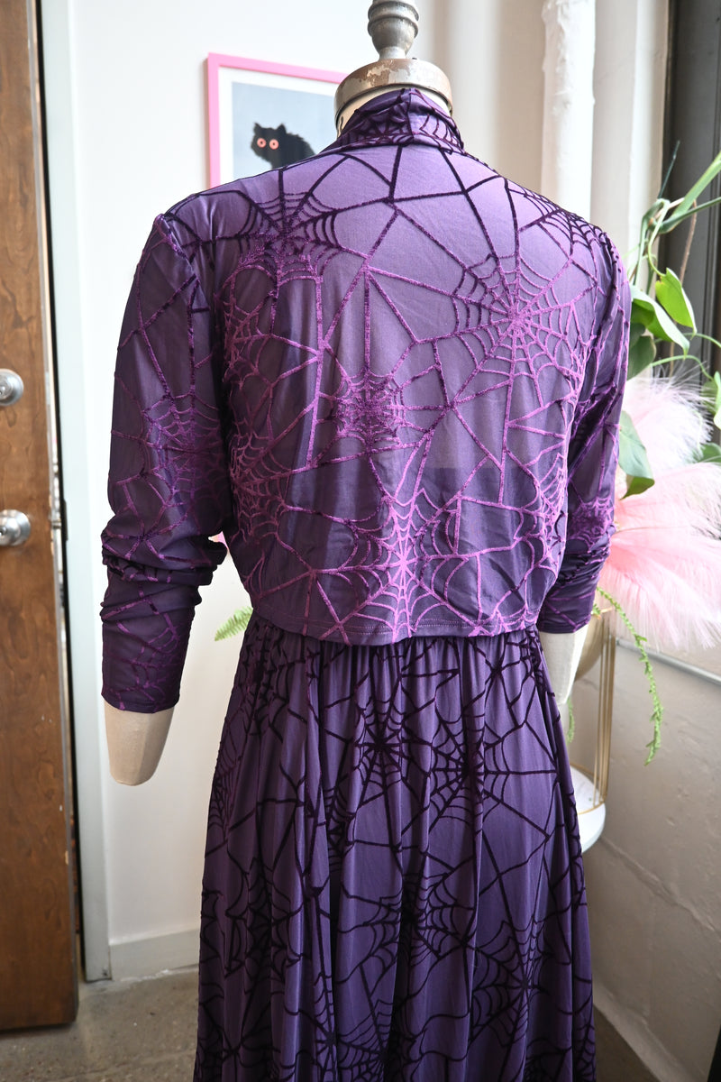 Back view of the Willow Dress and Bolero in violet, showcasing spiderweb fabric and shimmer lining.