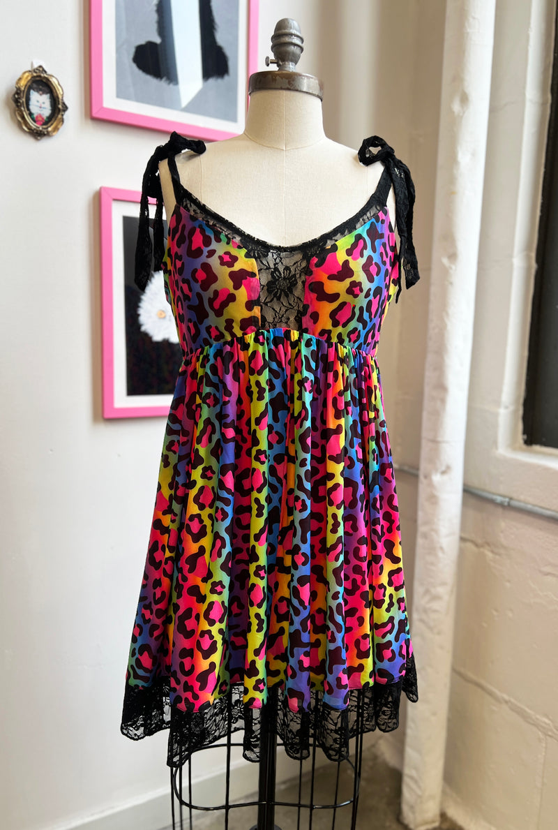 Josie Babydoll Dress in Rainbow Leopard Mesh, perfect for Pride celebrations.