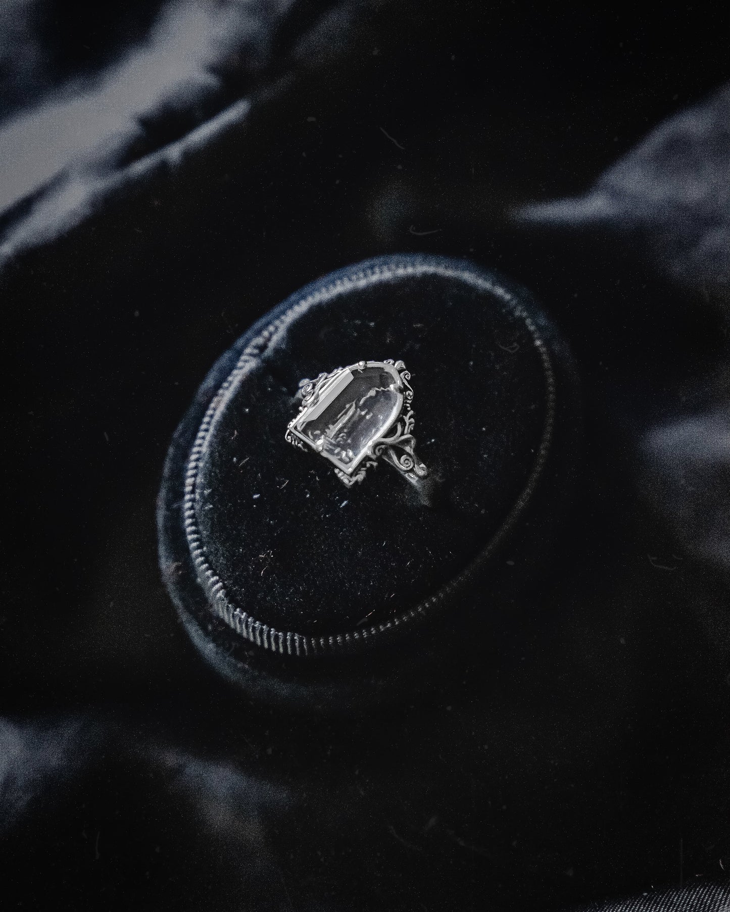 The "Mourning Candle” Glass Casket Ring by Petals and Poison