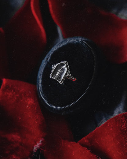 The "Mourning Candle” Glass Casket Ring by Petals and Poison