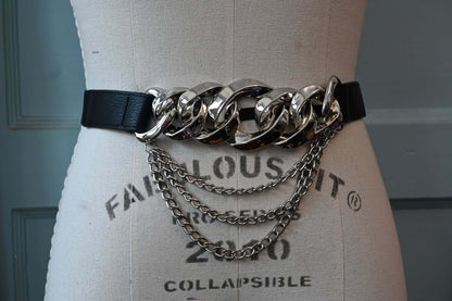 Black elastic belt with faux leather and silver chain detail